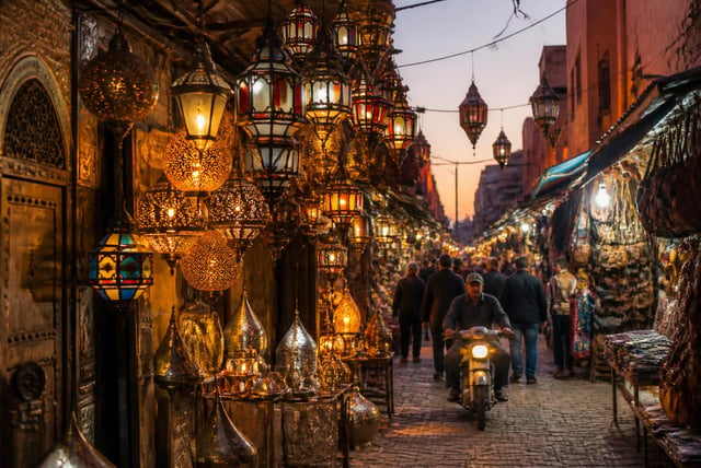 Ochre courtyard of a traditional riad in Marrakech at dusk